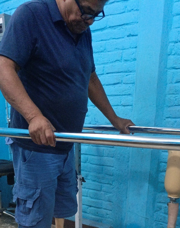 Margarito walking with his new prosthetic leg
