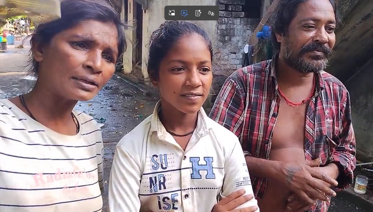 Mina with her family at the waste picker colony in Pondicherry