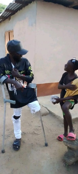 Maxwell — barber who works with a razor and a crutch at the same time