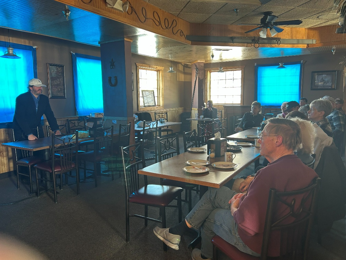 Daniel presenting at Pizza Ranch in Le Sueur to a group of old friends